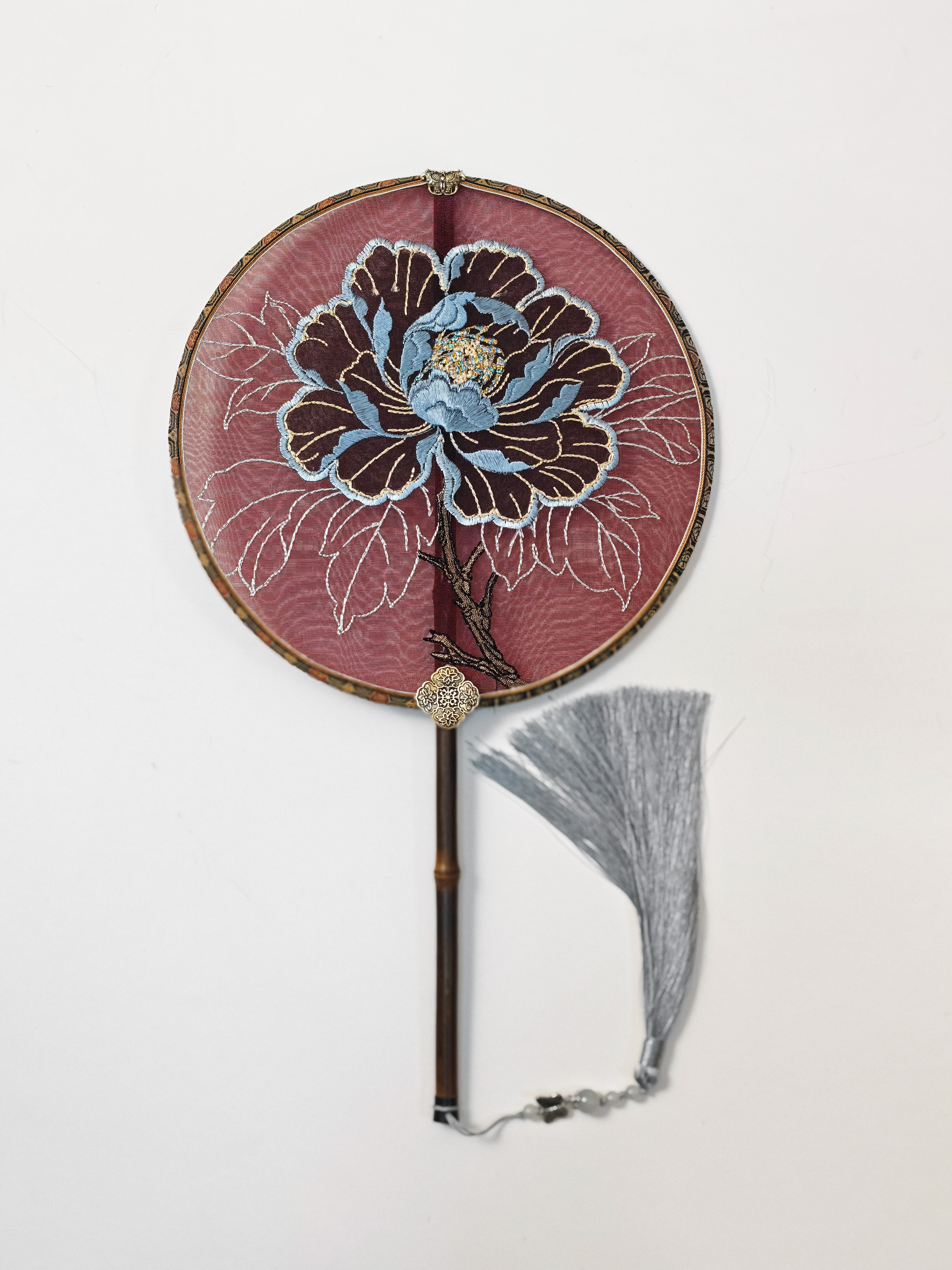 Peony high-end Chinese embroidery product with silk surface, wooden handle and grey tassel